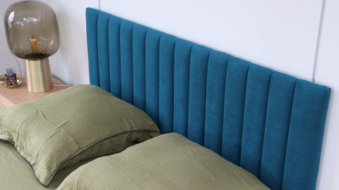 Tête de lit matelassé en velours bleu 140 cm - Eliot