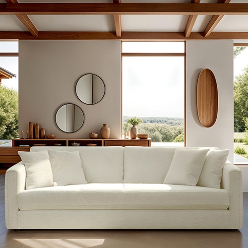 Canapé 3 places avec 4 coussins déco en tissu bouclette écru - Denver